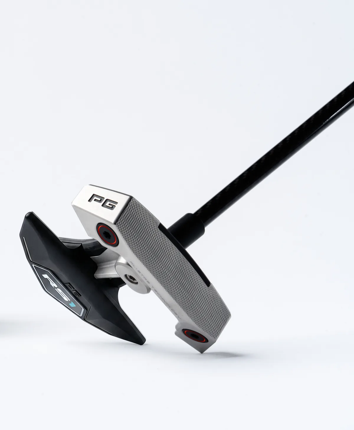 RS1 putter angled view showing CNC-machined face and weight ports