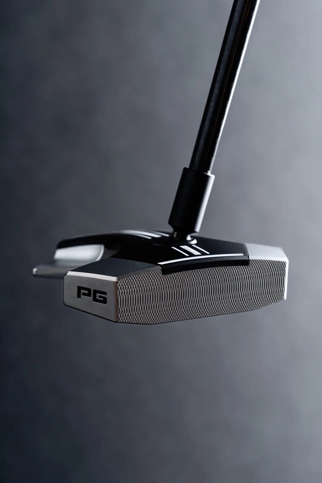 RS1 putter angled view with alignment lines and milled face