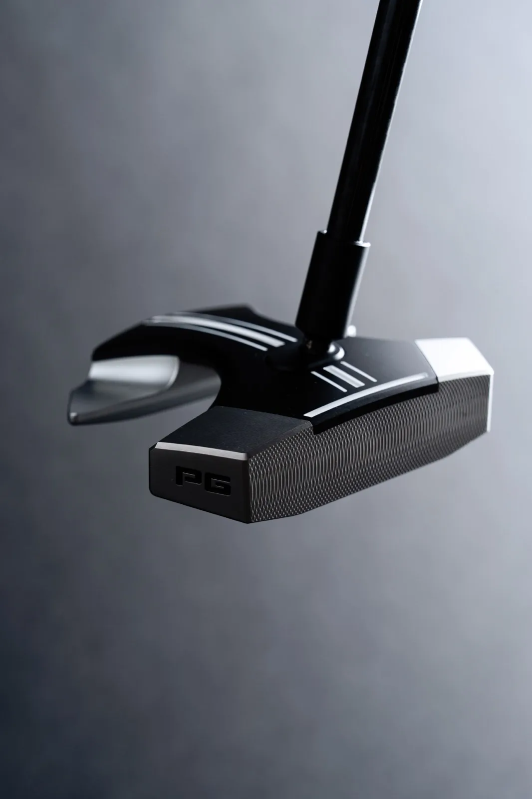 RS1 putter face with PG branding and milled insert