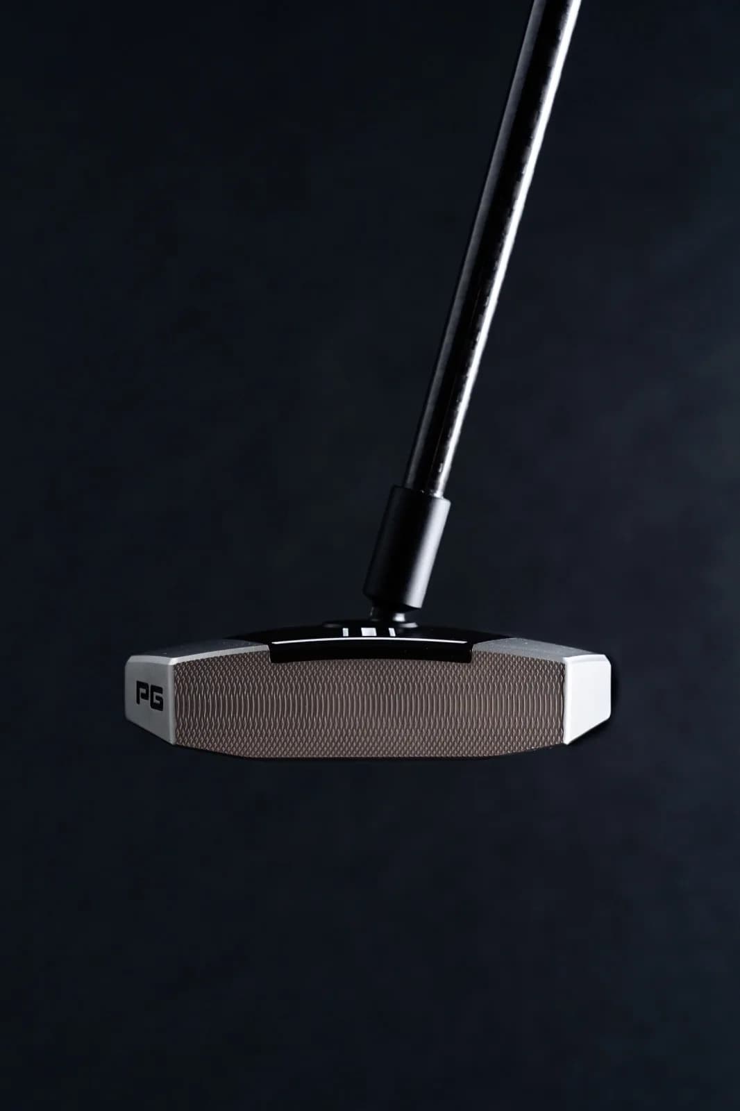 RS1 putter face front view showing milled texture