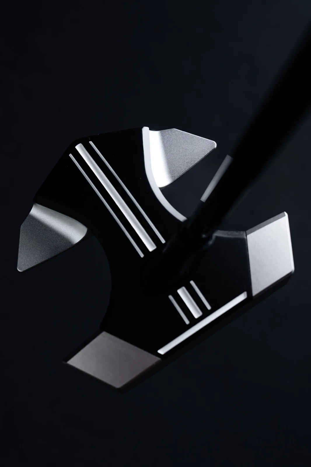 RS1 putter held up on course showing Roll Straight Technology
