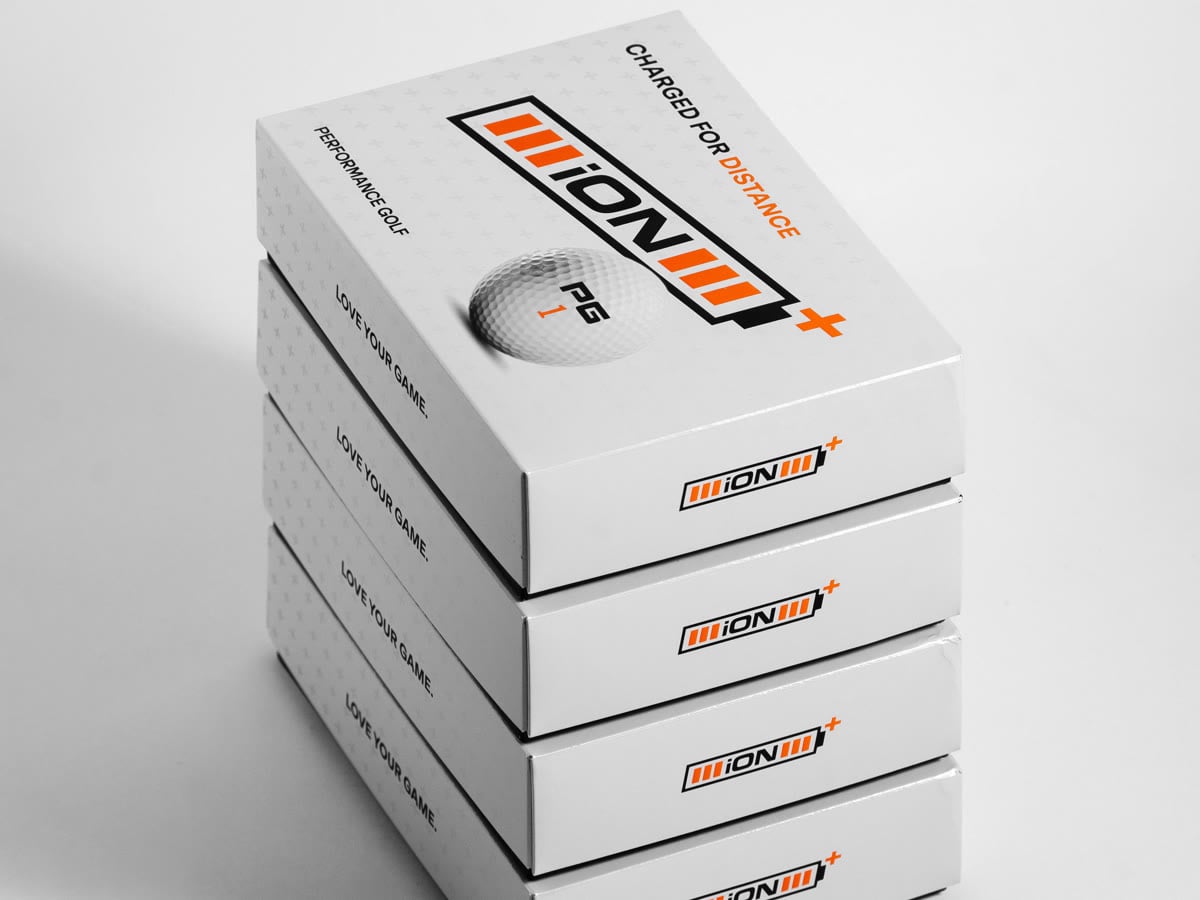 Stack of four iON+ dozen boxes in a studio