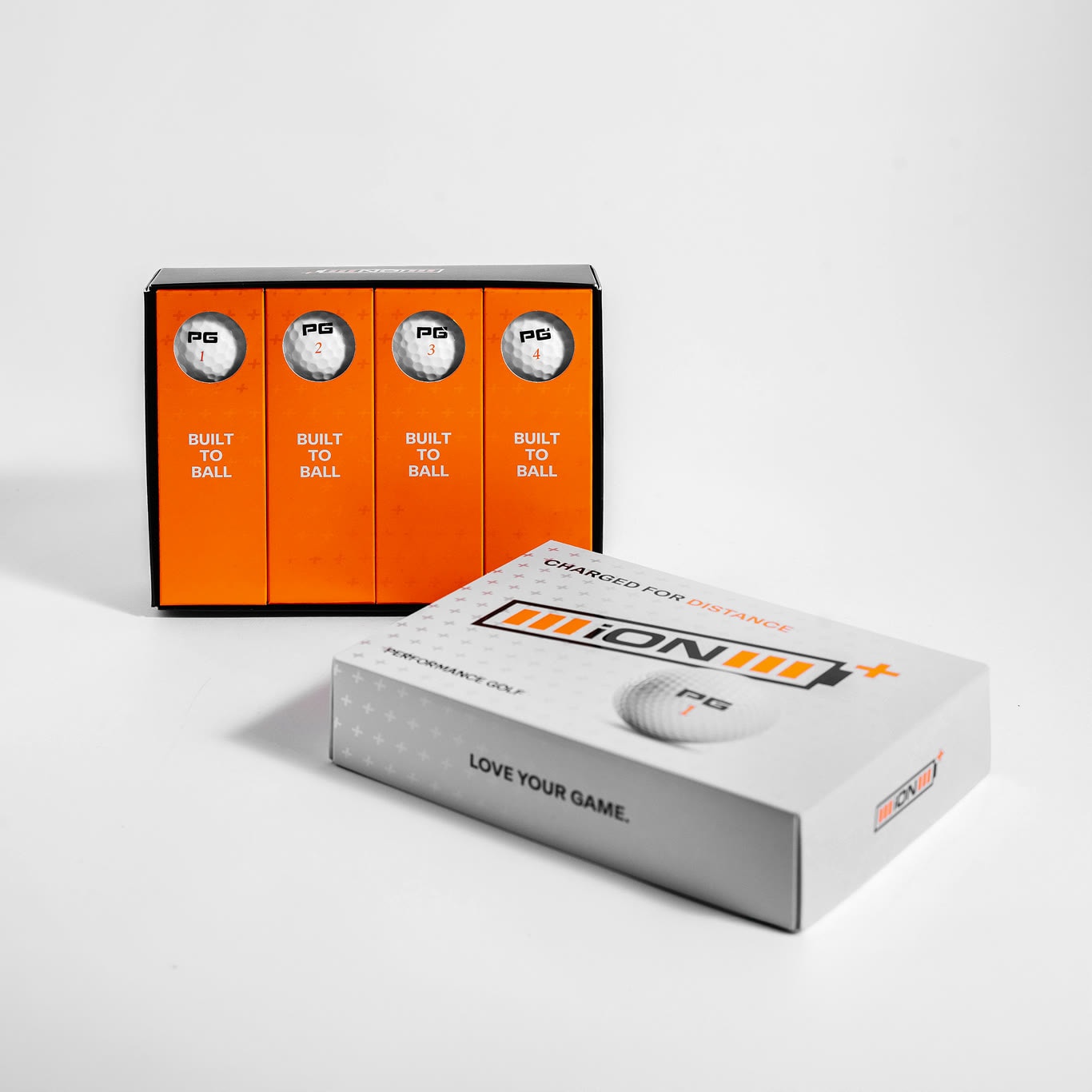 Open iON+ dozen box showing four sleeves of balls