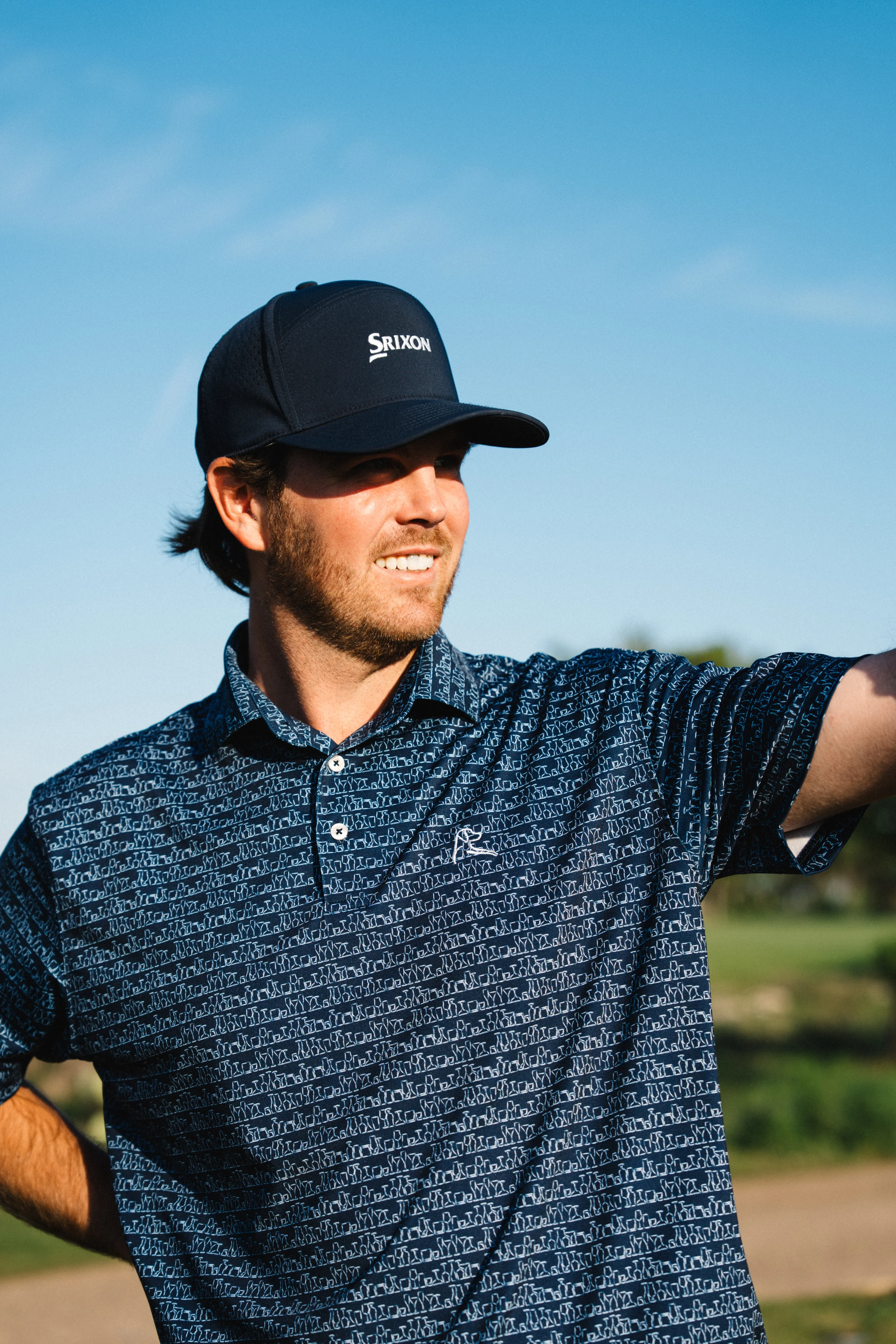 Golfer in Srixon hat on the course