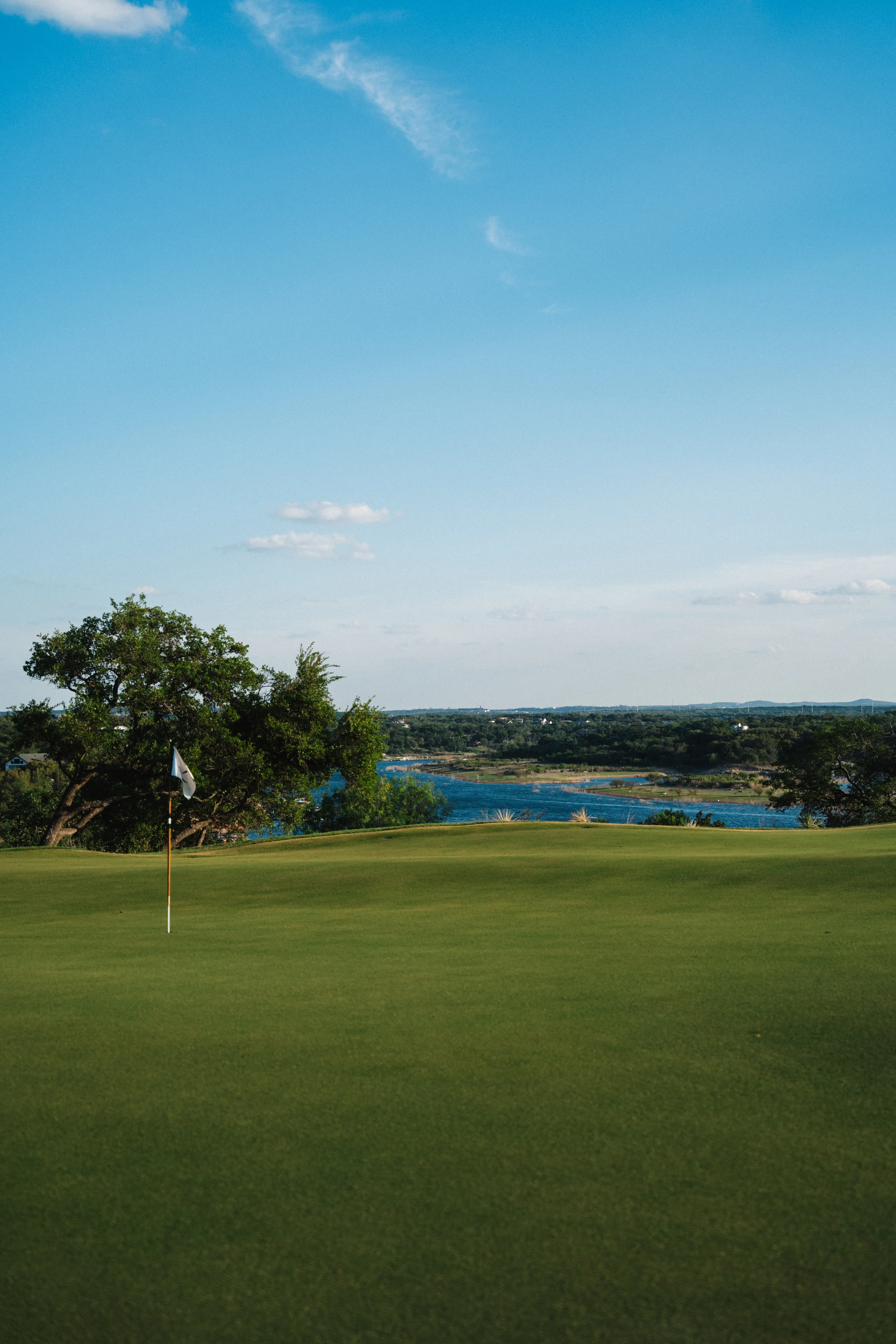 Wide view of the golf course with flag